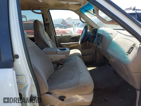 2001 Ford F-150 XLT with VIN 1FTRW07W21KE19926, listed as a IAAI auction lot 42750523 with Not provided miles and . Bid and sale history available at DreamBid. Image 5.