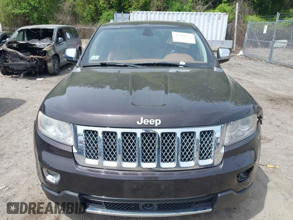 2011 Jeep Grand Cherokee Overland z VIN 1J4RR6GT2BC700758, wystawiony jako IAAI lot #42260235 z przebiegiem 98 609 mil mil oraz . Historia ofert i sprzedaży dostępna na DreamBid. Obrazek 12.