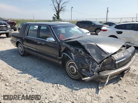 1992 Chrysler New Yorker z VIN 1C3XV66R2ND759195, wystawiony jako Copart lot #69650044 z przebiegiem 70 387 mil mil oraz Szkoda całkowita • Salvage title. Historia ofert i sprzedaży dostępna na DreamBid. Obrazek 4.