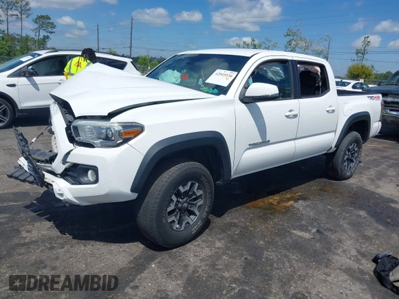 2020 Toyota Tacoma SR5 z VIN 5TFCZ5AN5LX231157, wystawiony jako IAAI lot #42045534 z przebiegiem 84 099 mil mil oraz . Historia ofert i sprzedaży dostępna na DreamBid. Obrazek 2.
