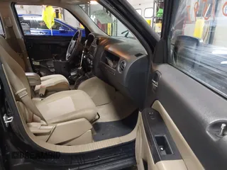 2014 Jeep Patriot Latitude with VIN 1C4NJPFB4ED645447, listed as a IAAI auction lot 41851597 with 128,319 mi miles and . Bid and sale history available at carsss.com. Image 5.