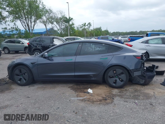 2021 Tesla Model 3 Long Range with VIN 5YJ3E1EBXMF836789, listed as a IAAI auction lot 41900027 with 71,086 mi miles. Bid and sale history available at carsss.com. Image 14.