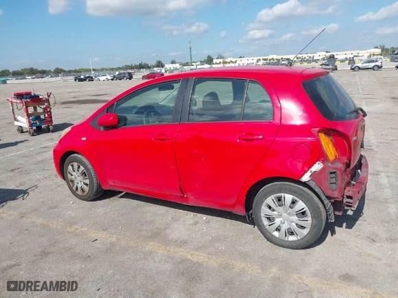2010 Toyota Yaris with VIN JTDKT4K31A5318034, listed as a IAAI auction lot 41322096 with 114,817 mi miles. Bid and sale history available at carsss.com. Image 15.