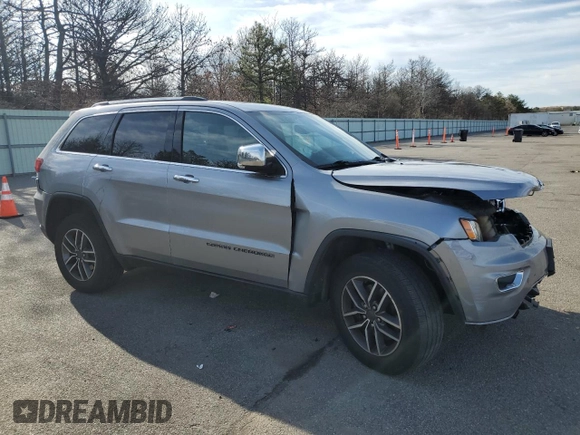 2021 Jeep Grand Cherokee 80th Anniversary with VIN 1C4RJFBG7MC665757, listed as a Copart auction lot 52443235 with 99,828 mi miles and Salvage Title. Bid and sale history available at DreamBid. Image 4.