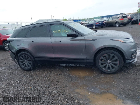 2019 Land Rover Range Rover Velar R-Dynamic SE z VIN SALYL2EX1KA227926, wystawiony jako IAAI lot #42353130 z przebiegiem 39 890 mil mil oraz . Historia ofert i sprzedaży dostępna na DreamBid. Obrazek 13.