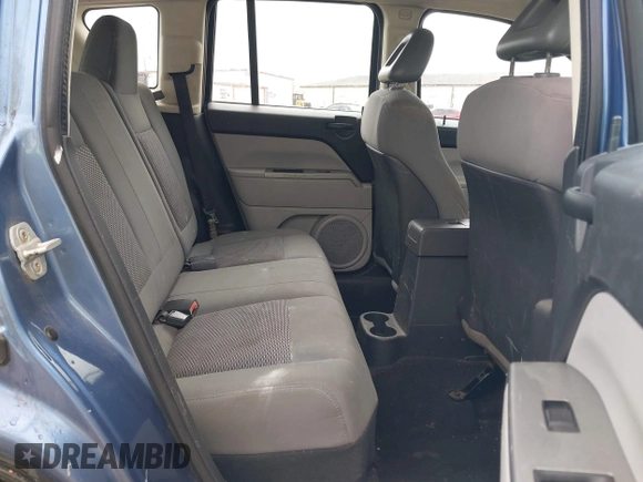 2007 Jeep Compass Sport with VIN 1J8FT47W57D215243, listed as a IAAI auction lot 41925203 with 255,193 mi miles. Bid and sale history available at carsss.com. Image 8.