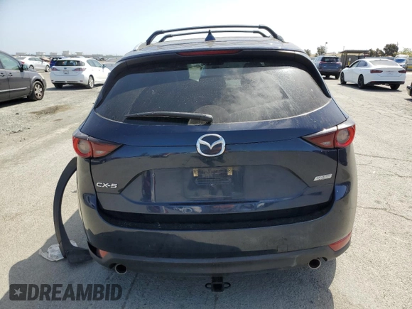2018 Mazda CX-5 Touring with VIN JM3KFACM6J1323449, listed as a Copart auction lot 54090445 with 93,748 mi miles and Salvage Title. Bid and sale history available at carsss.com. Image 6.