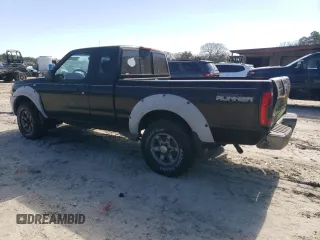 2001 Nissan Frontier SE Desert Runner with VIN 1N6ED26T41C403063, listed as a Copart auction lot 48227135 with 262,014 mi miles and Clean title. Bid and sale history available at DreamBid. Image 2.