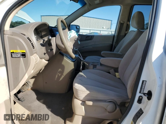 2009 Kia Sedona LX with VIN KNDMB233X96275253, listed as a Copart auction lot 75647264 with 202,841 mi miles and Salvage Title. Bid and sale history available at carsss.com. Image 7.