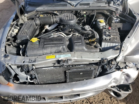2000 Dodge Durango with VIN 1B4HS28Z6YF255687, listed as a Copart auction lot 84959164 with 189,369 mi miles and Salvage Title. Bid and sale history available at DreamBid. Image 13.