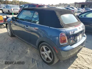 2009 MINI Convertible with VIN WMWMR33559TU96728, listed as a Copart auction lot 77949004 with 86,084 mi miles and Clean title. Bid and sale history available at DreamBid. Image 2.