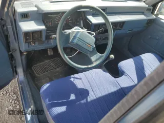 1989 Mitsubishi Mighty Max z VIN JA7FL24D7KP055207, wystawiony jako Copart lot #53172405 z przebiegiem 118 439 mil mil oraz Szkoda całkowita • Salvage title. Historia ofert i sprzedaży dostępna na DreamBid. Obrazek 8.