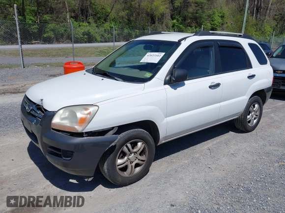 2006 Kia Sportage LX with VIN KNDJF723567151614, listed as a IAAI auction lot 42022102 with 128,564 mi miles and . Bid and sale history available at carsss.com. Image 19.