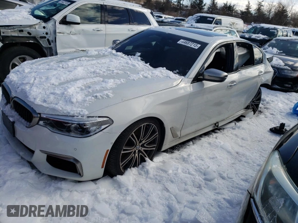 2018 BMW 5 Series M550i xDrive с VIN WBAJB9C59JB050103, выставлен на аукционе Copart как лот 44687215 с пробегом Не указан миль и Списание • Salvage title. История ставок и продаж доступна на DreamBid. Изображение 1.