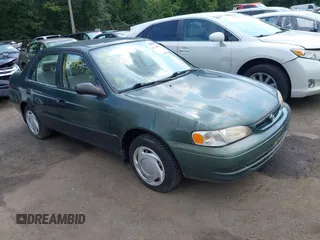 2000 Toyota Corolla VE with VIN 2T1BR12E3YC363259, listed as a IAAI auction lot 42732971 with 91,734 mi miles and . Bid and sale history available at DreamBid. Image 1.