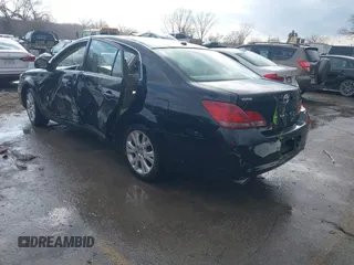 2010 Toyota Avalon XL with VIN 4T1BK3DBXAU357773, listed as a IAAI auction lot 41228045 with 127,403 mi miles and . Bid and sale history available at carsss.com. Image 3.