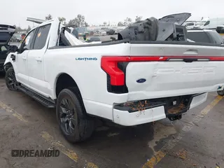 2023 Ford F-150 Lightning Pro with VIN 1FT6W1EV8PWG05765, listed as a IAAI auction lot 41461450 with Not Provided miles and . Bid and sale history available at DreamBid. Image 3.