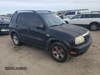 2003 Suzuki Grand Vitara z VIN JS3TE62V834101506, wystawiony jako Copart lot #47094765 z przebiegiem 240 778 mil mil oraz Szkoda całkowita • Salvage title. Historia ofert i sprzedaży dostępna na DreamBid. Obrazek 4.