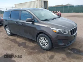 2015 Kia Sedona LX with VIN KNDMB5C13F6072586, listed as a IAAI auction lot 42090232 with 125,818 mi miles. Bid and sale history available at carsss.com. Image 1.