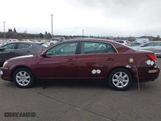 2005 Toyota Avalon XL with VIN 4T1BK36B65U062012, listed as a IAAI auction lot 38430672 with 150,383 mi miles. Bid and sale history available at carsss.com. Image 14.