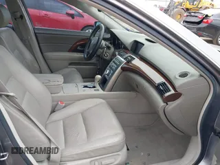 2006 Acura RL z VIN JH4KB16526C006190, wystawiony jako IAAI lot #42351400 z przebiegiem 150 749 mil mil oraz . Historia ofert i sprzedaży dostępna na DreamBid. Obrazek 5.