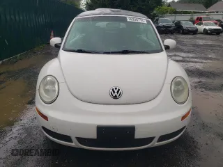 2009 Volkswagen Beetle S с VIN 3VWRF31Y39M403747, выставлен на аукционе Copart как лот 56206715 с пробегом 174 928 миль миль и Чистый • Clean title. История ставок и продаж доступна на DreamBid. Изображение 5.