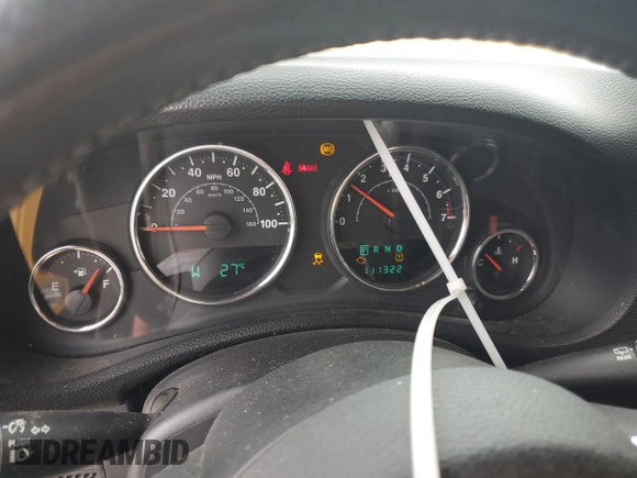 2014 Jeep Wrangler Sahara with VIN 1C4AJWBG8EL144691, listed as a Copart auction lot 71172514 with 111,322 mi miles and Salvage title. Bid and sale history available at DreamBid. Image 9.