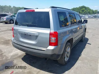 2015 Jeep Patriot Sport with VIN 1C4NJRBBXFD291890, listed as a IAAI auction lot 42570079 with 204,455 mi miles and . Bid and sale history available at DreamBid. Image 4.