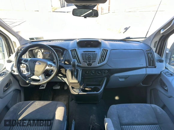 2017 Ford Transit Passenger XL with VIN 1FBVU4XG1HKA50432, listed as a Copart auction lot 83802734 with 144,324 mi miles and Clean Title. Bid and sale history available at DreamBid. Image 7.