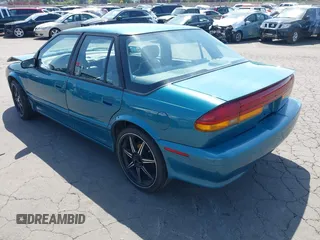 1995 Saturn SL with VIN 1G8ZK5277SZ320711, listed as a IAAI auction lot 42115543 with 77,558 mi miles and . Bid and sale history available at DreamBid. Image 3.