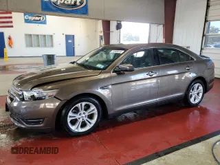 2015 Ford Taurus SEL with VIN 1FAHP2E94FG157022, listed as a Copart auction lot 74569614 with 133,223 mi miles and Salvage Title. Bid and sale history available at DreamBid. Image 1.