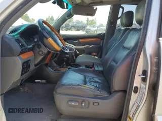 2004 Lexus GX 470 with VIN JTJBT20X640052213, listed as a Copart auction lot 52708415 with 390,451 mi miles and Salvage Title. Bid and sale history available at carsss.com. Image 7.