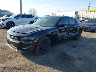 2016 Dodge Charger SXT with VIN 2C3CDXJG1GH188947, listed as a IAAI auction lot 41898582 with 106,743 mi miles. Bid and sale history available at carsss.com. Image 2.