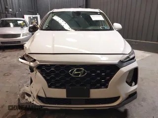 2020 Hyundai Santa Fe SE with VIN 5NMS2CAD8LH163523, listed as a IAAI auction lot 42123756 with 72,992 mi miles and . Bid and sale history available at DreamBid. Image 13.