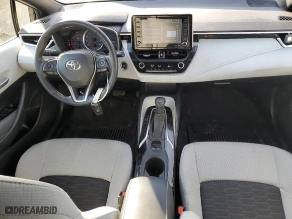 2022 Toyota Corolla Hatchback SE with VIN JTND4MBE1N3158709, listed as a Copart auction lot 77452694 with 74,299 mi miles and Salvage Title. Bid and sale history available at carsss.com. Image 8.