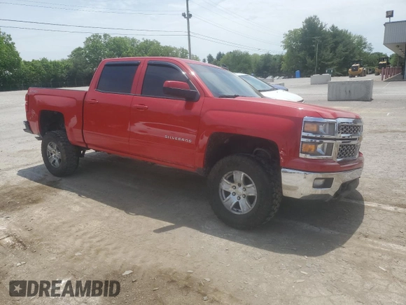 2015 Chevrolet Silverado 1500 LT with VIN 3GCUKREH8FG116887, listed as a Copart auction lot 54676424 with 112,097 mi miles and Salvage Title. Bid and sale history available at DreamBid. Image 4.