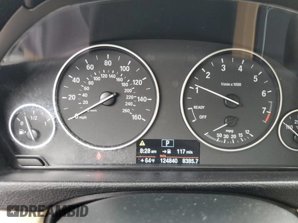 2013 BMW 3 Series 328i xDrive z VIN WBA3B3C53DF541561, wystawiony jako Copart lot #56540965 z przebiegiem 124 840 mil mil oraz Szkoda całkowita • Salvage title. Historia ofert i sprzedaży dostępna na DreamBid. Obrazek 9.