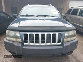 2004 Jeep Grand Cherokee Laredo z VIN 1J4GW48S64C152101, wystawiony jako IAAI lot #42165988 z przebiegiem 244 247 mil mil oraz . Historia ofert i sprzedaży dostępna na DreamBid. Obrazek 6.