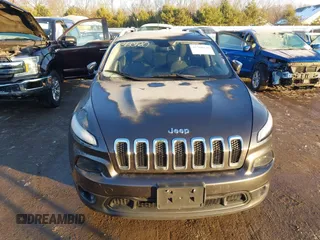 2015 Jeep Cherokee Latitude z VIN 1C4PJLCB9FW525798, wystawiony jako IAAI lot #41360120 z przebiegiem 130 219 mil mil oraz . Historia ofert i sprzedaży dostępna na DreamBid. Obrazek 13.