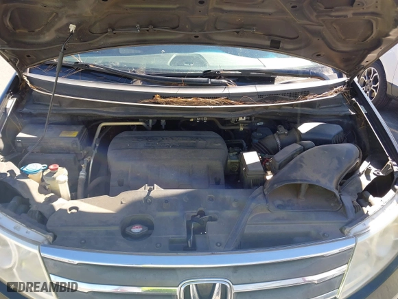 2013 Honda Odyssey Touring with VIN 5FNRL5H99DB076385, listed as a IAAI auction lot 41751504 with 233,875 mi miles. Bid and sale history available at carsss.com. Image 10.