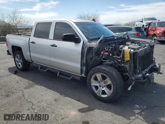2018 Chevrolet Silverado 1500 Custom with VIN 3GCPCPEH0JG134579, listed as a Copart auction lot 50581845 with 125,133 mi miles and Salvage Title. Bid and sale history available at DreamBid. Image 4.