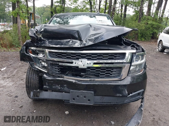 2015 Chevrolet Tahoe LT with VIN 1GNSCBKC9FR600997, listed as a IAAI auction lot 42383789 with 161,151 mi miles and . Bid and sale history available at DreamBid. Image 6.