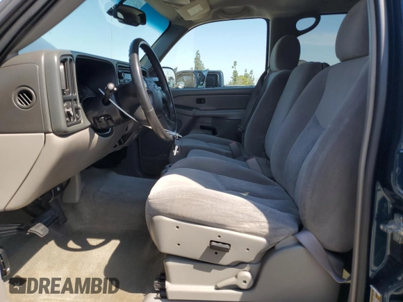 2005 Chevrolet Tahoe LS with VIN 1GNEC13V75R173583, listed as a Copart auction lot 59998015 with 164,575 mi miles and Salvage title. Bid and sale history available at DreamBid. Image 7.