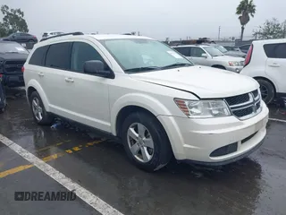 2013 Dodge Journey SE with VIN 3C4PDCAB1DT558033, listed as a IAAI auction lot 41804619 with 204,567 mi miles. Bid and sale history available at carsss.com. Image 1.