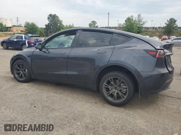 2024 Tesla Model Y z VIN 7SAYGDED4RA331714, wystawiony jako Copart lot #57043915 z przebiegiem Nie podano mil oraz Szkoda całkowita • Salvage title. Historia ofert i sprzedaży dostępna na DreamBid. Obrazek 2.
