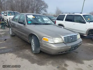 2003 Ford Crown Victoria LX with VIN 2FAFP74W03X195753, listed as a IAAI auction lot 41725365 with NaN miles. Bid and sale history available at carsss.com. Image 1.