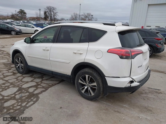 2018 Toyota RAV4 XLE with VIN JTMRFREV6JJ734927, listed as a IAAI auction lot 41510616 with 119,687 mi miles. Bid and sale history available at carsss.com. Image 3.