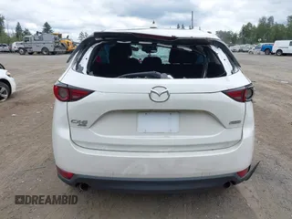 2018 Mazda CX-5 Grand Touring with VIN JM3KFBDM1J0382306, listed as a IAAI auction lot 42554947 with 121,303 mi miles and . Bid and sale history available at DreamBid. Image 16.