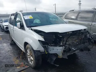 2019 Dodge Grand Caravan SXT with VIN 2C4RDGCG8KR758707, listed as a IAAI auction lot 41571385 with 140,000 mi miles. Bid and sale history available at carsss.com. Image 1.