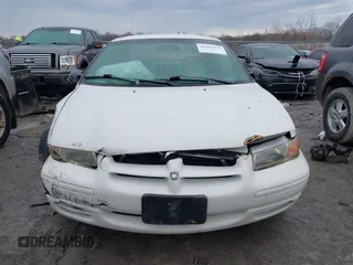 1999 Dodge Stratus z VIN 1B3EJ46X6XN614967, wystawiony jako IAAI lot #41663475 z przebiegiem 130 245 mil mil oraz . Historia ofert i sprzedaży dostępna na DreamBid. Obrazek 12.